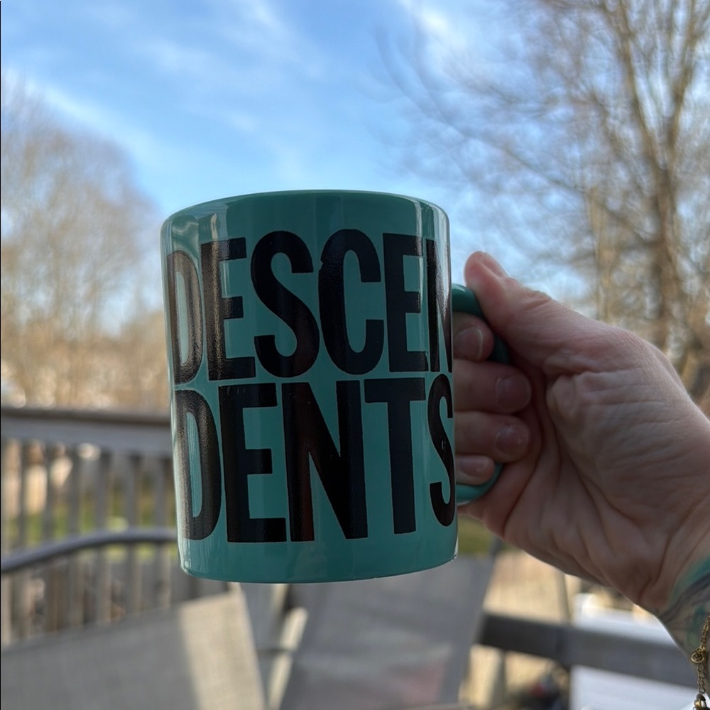 Turquoise Mug with Bold Black 'DESCENDENTS' Graphic